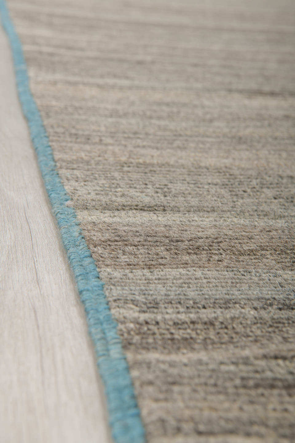 6' x 9' one-of-a-kind handmade vintage Tulu medium size rug. Color palette: taupe, ivory, charcoal, camel, sky_blue, beige