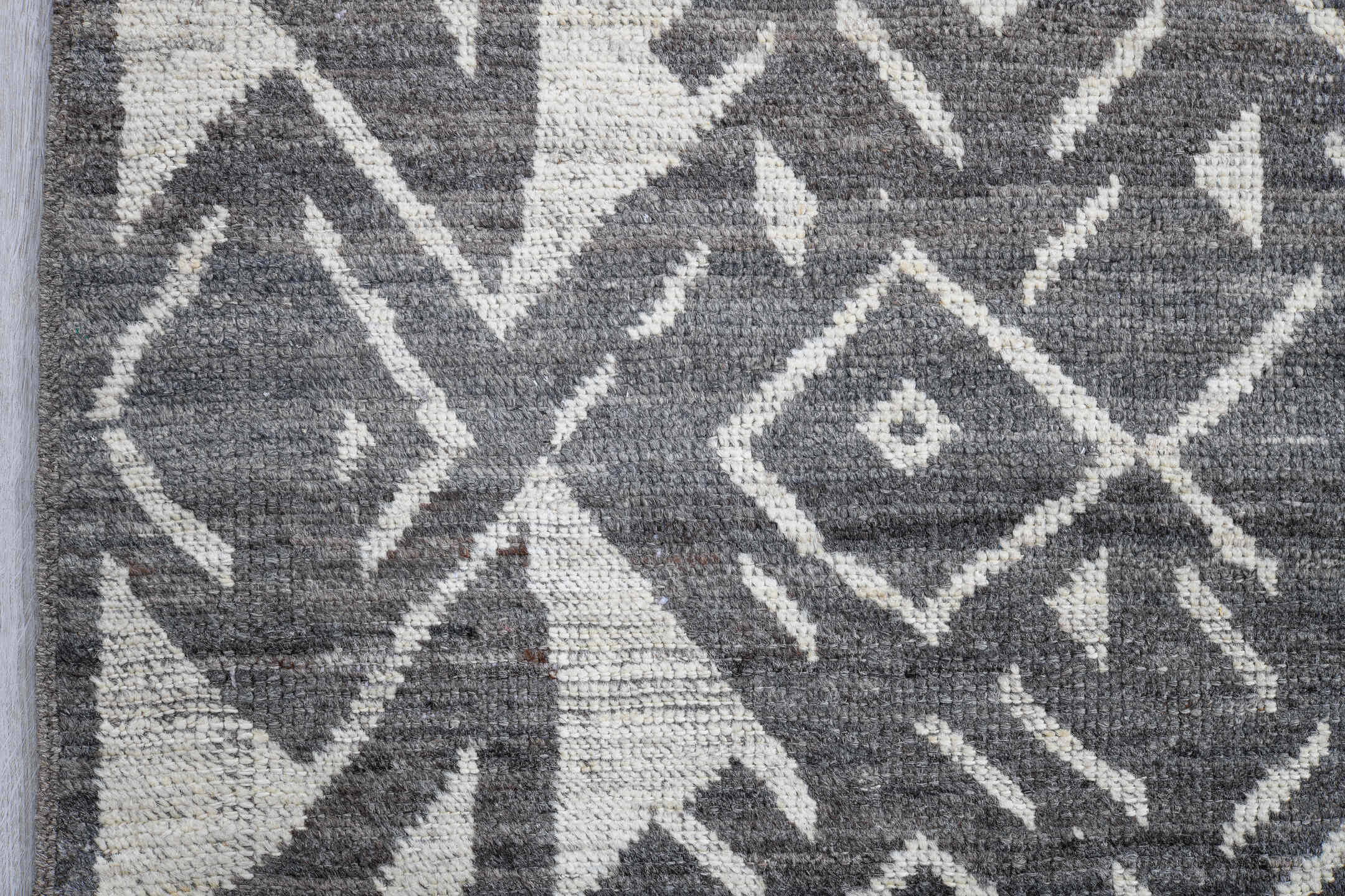 5' x 9' one-of-a-kind handmade vintage Tulu medium size rug. Color palette: gray, ivory, charcoal, taupe, black, beige