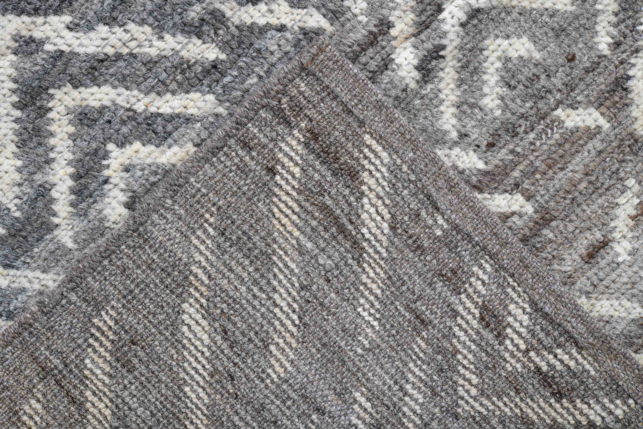 5' x 9' one-of-a-kind handmade vintage Tulu medium size rug. Color palette: gray, ivory, charcoal, taupe, black, beige