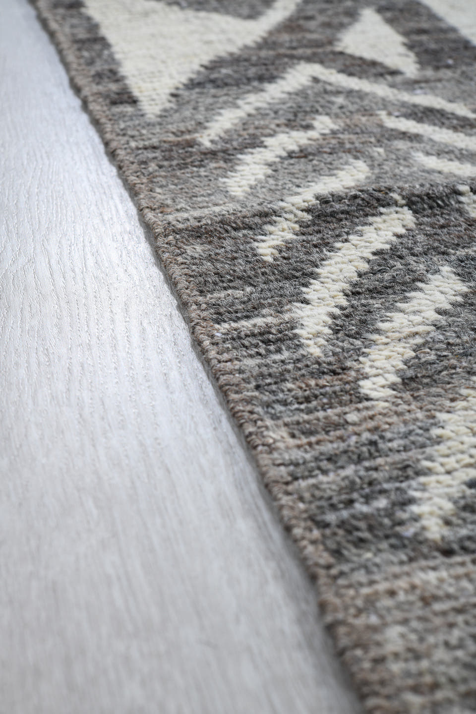 5' x 9' one-of-a-kind handmade vintage Tulu medium size rug. Color palette: gray, ivory, charcoal, taupe, black, beige