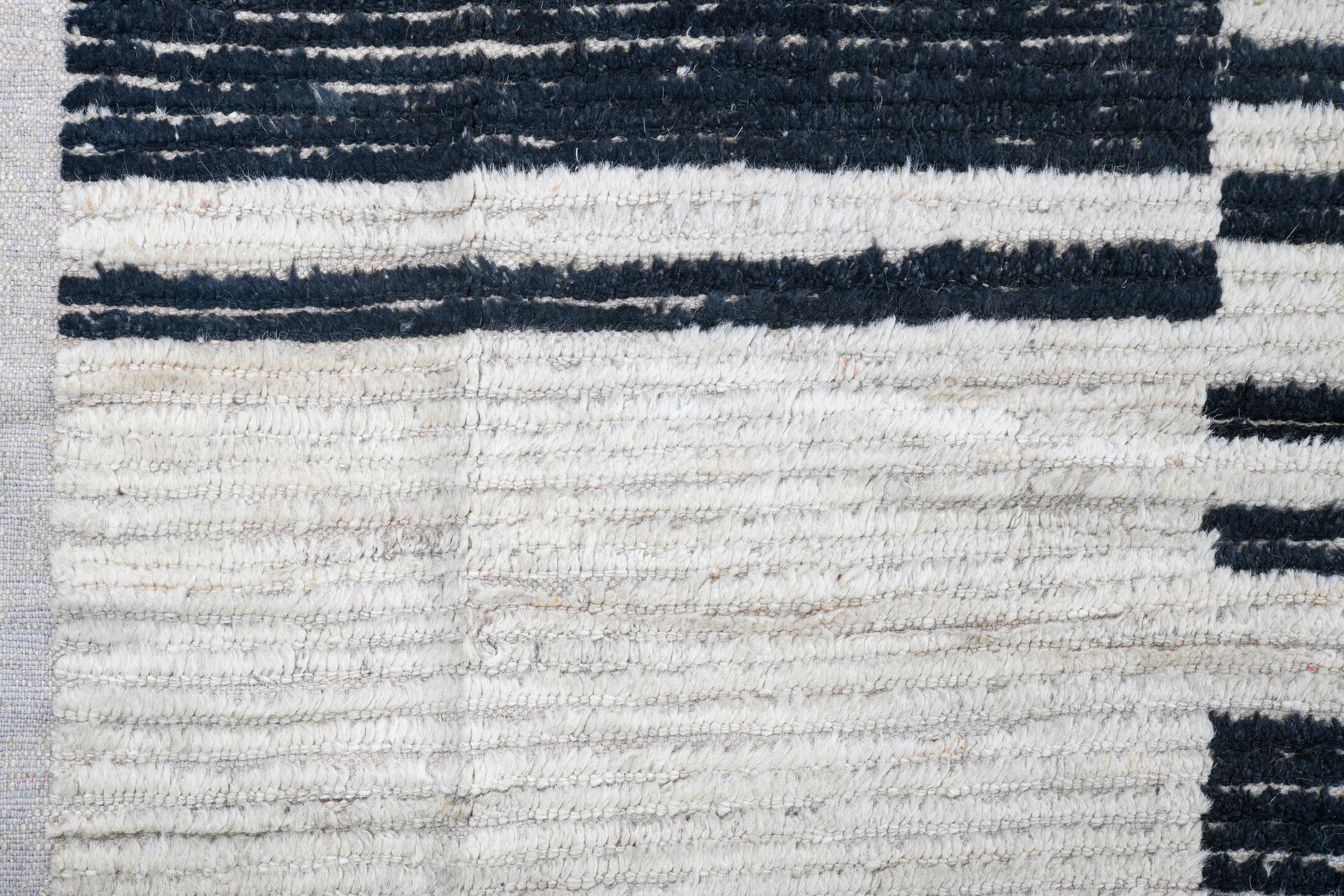 10' x 14' one-of-a-kind handmade vintage Tulu large size rug. Color palette: ivory, charcoal, black, gray