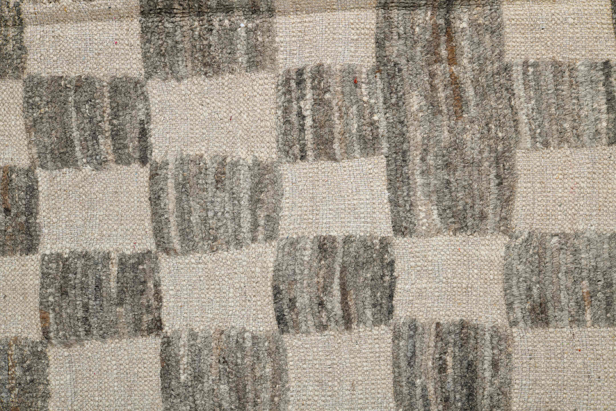 6' x 9' one-of-a-kind handmade vintage Tulu medium size rug. Color palette: black, gray, light gray, off-white, silver