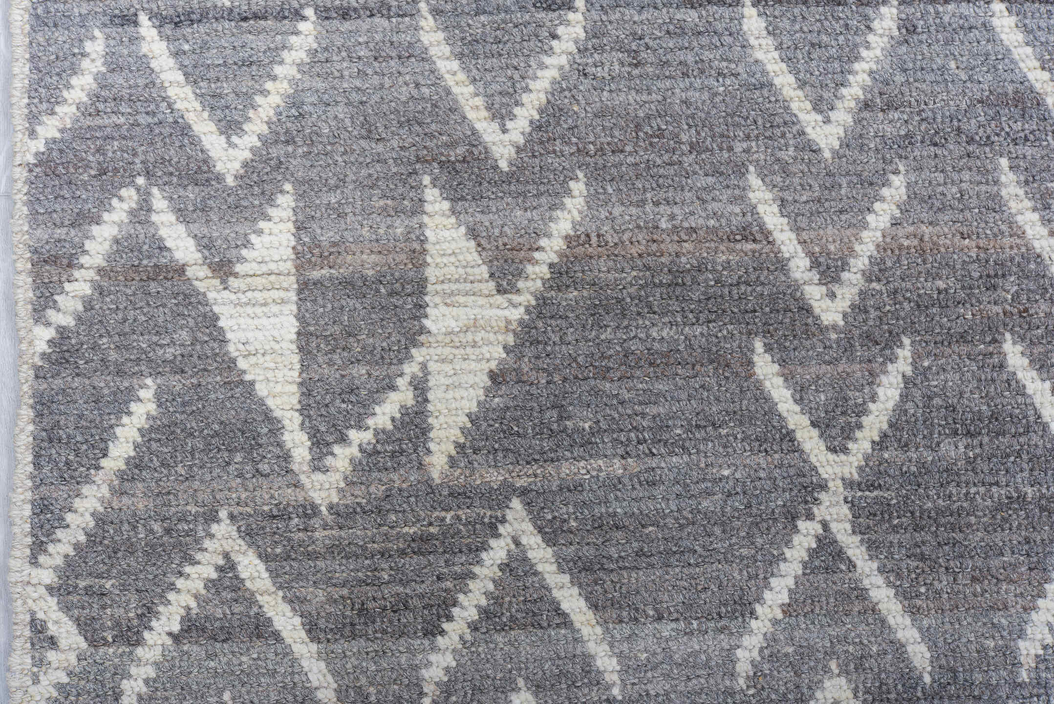 6' x 9' one-of-a-kind handmade vintage Tulu medium size rug. Color palette: gray, ivory, charcoal, black