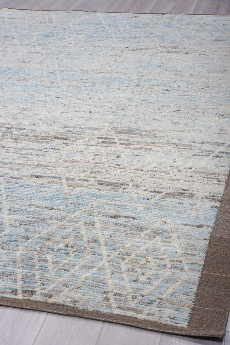 9' x 11' one-of-a-kind handmade vintage Tulu large size rug. Color palette: pale blue, ivory, taupe, gray, light blue, beige