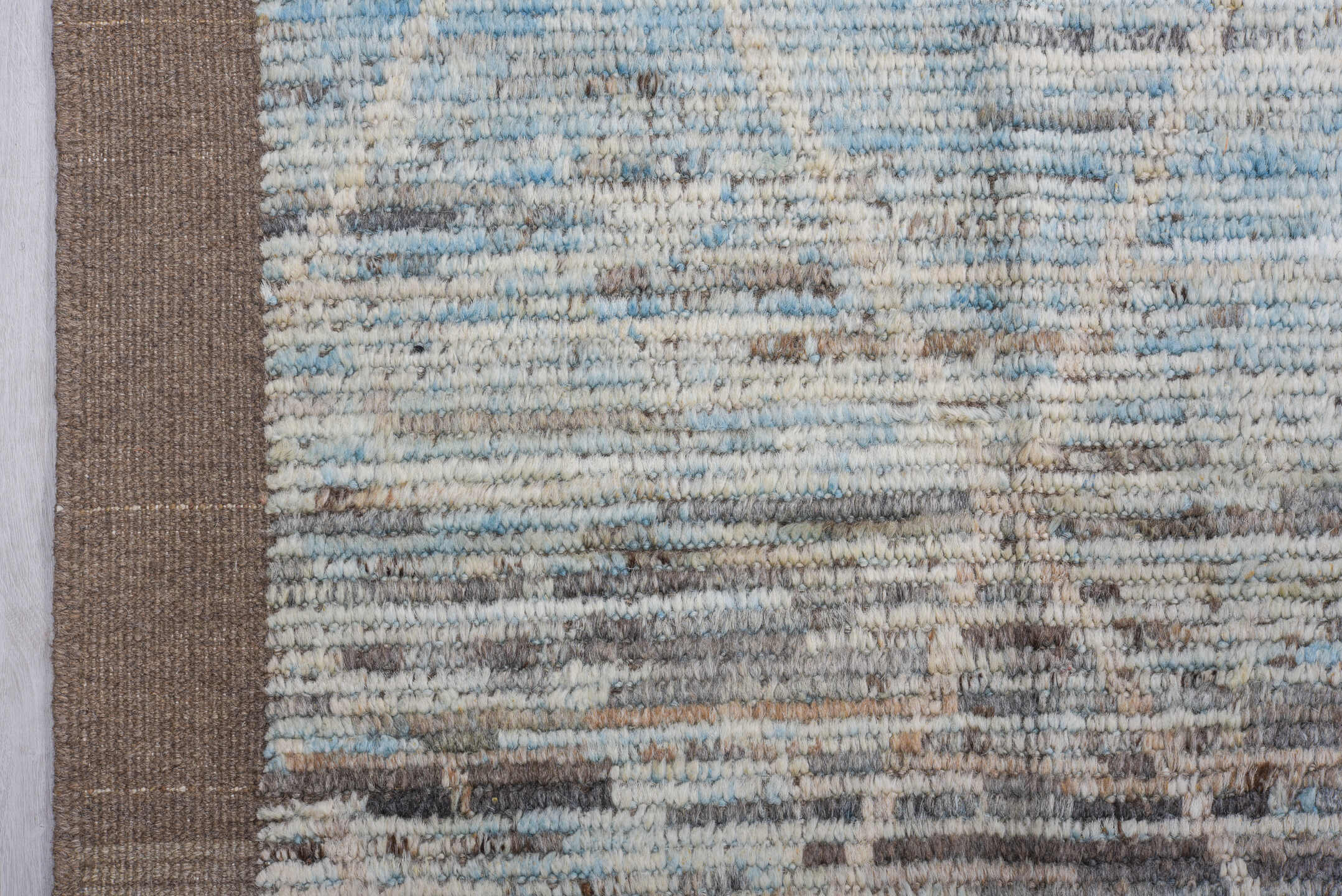 9' x 11' one-of-a-kind handmade vintage Tulu large size rug. Color palette: pale blue, ivory, taupe, gray, light blue, beige