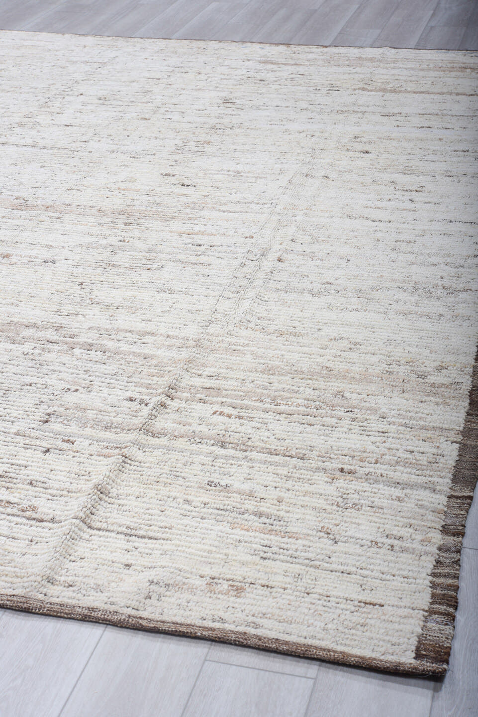 9' x 12' one-of-a-kind handmade vintage Tulu large size rug. Color palette: ivory, taupe, brown, gray, beige