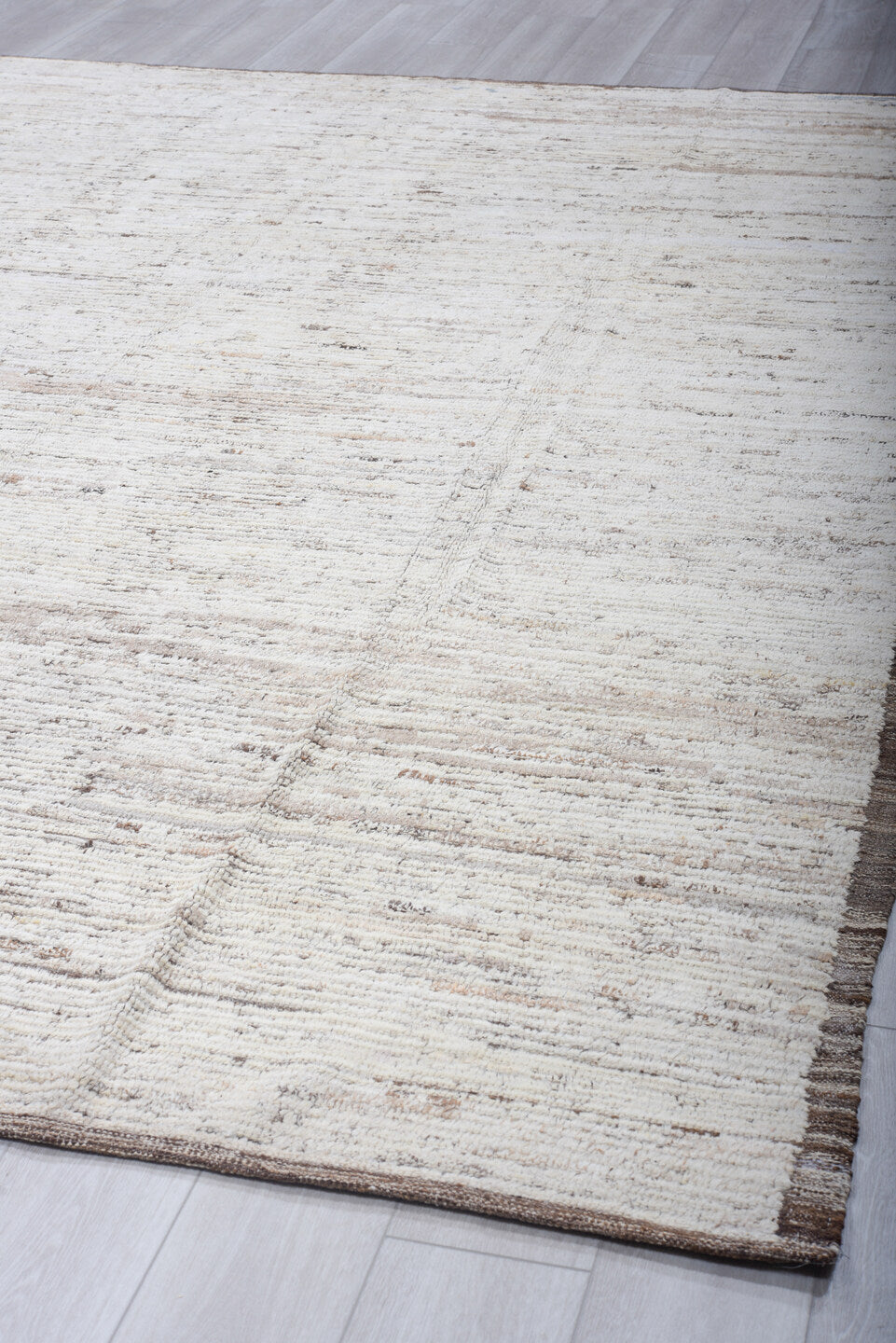 9' x 12' one-of-a-kind handmade vintage Tulu large size rug. Color palette: ivory, taupe, brown, gray, beige
