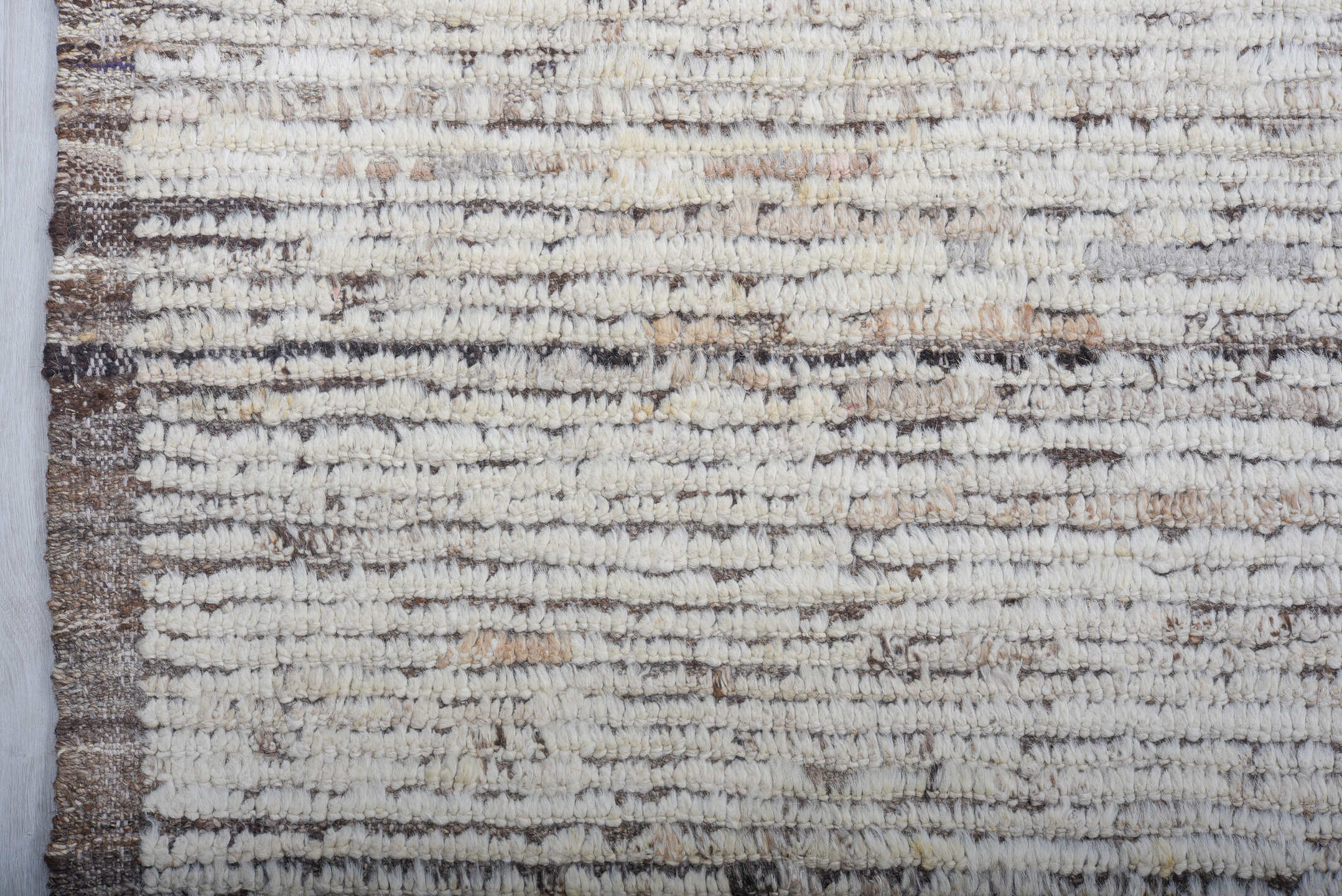 9' x 12' one-of-a-kind handmade vintage Tulu large size rug. Color palette: ivory, taupe, brown, gray, beige