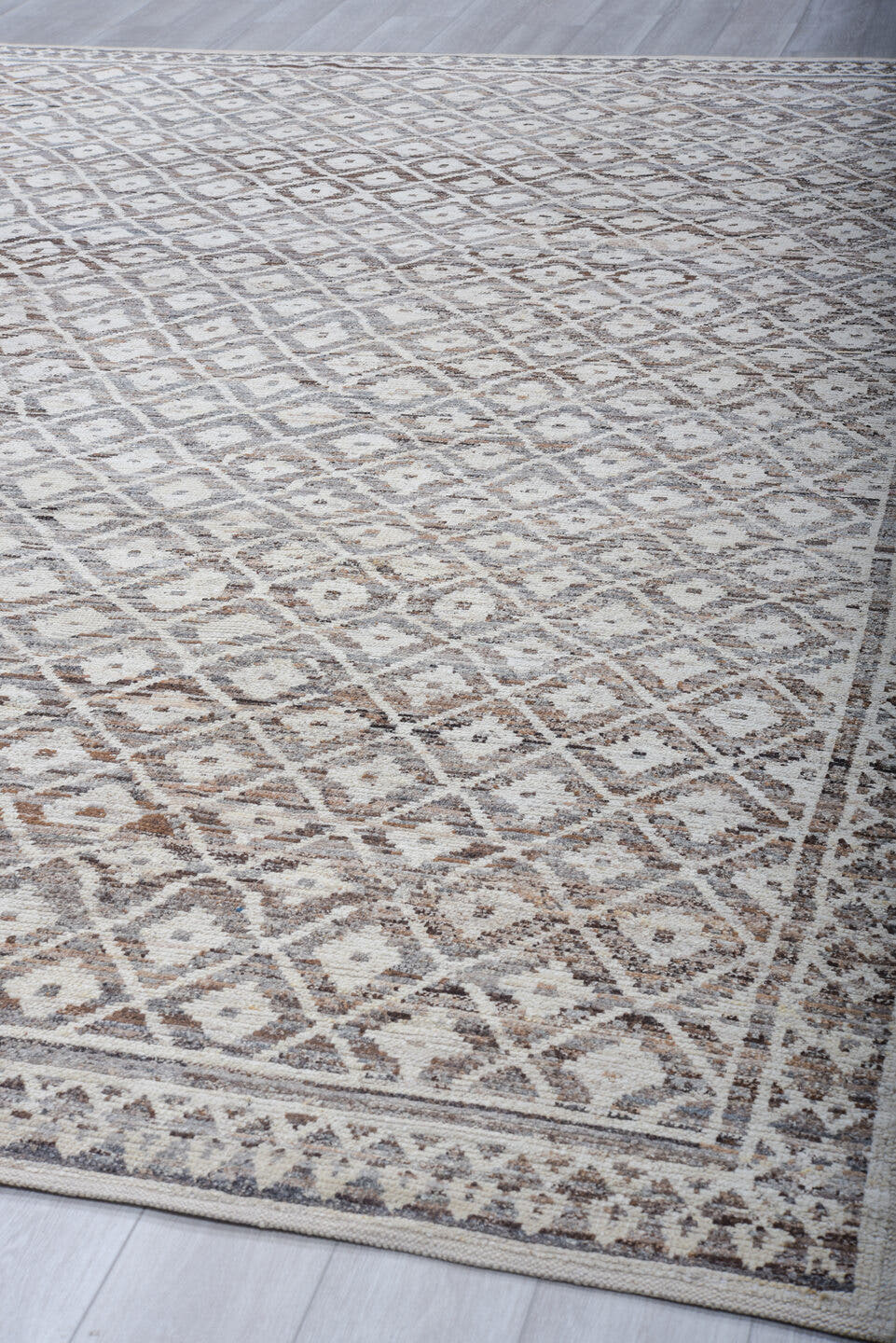 10' x 13' one-of-a-kind handmade vintage Tulu large size rug. Color palette: ivory, taupe, brown, gray, charcoal, cream