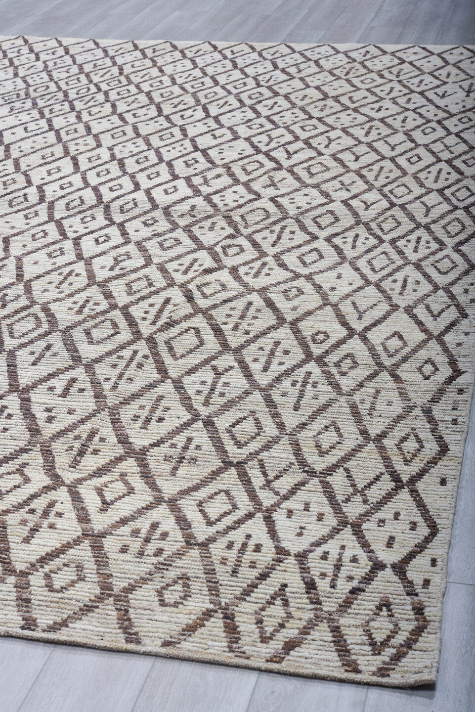 9' x 12' one-of-a-kind handmade vintage Tulu large size rug. Color palette: ivory, charcoal, taupe, brown, gray, black