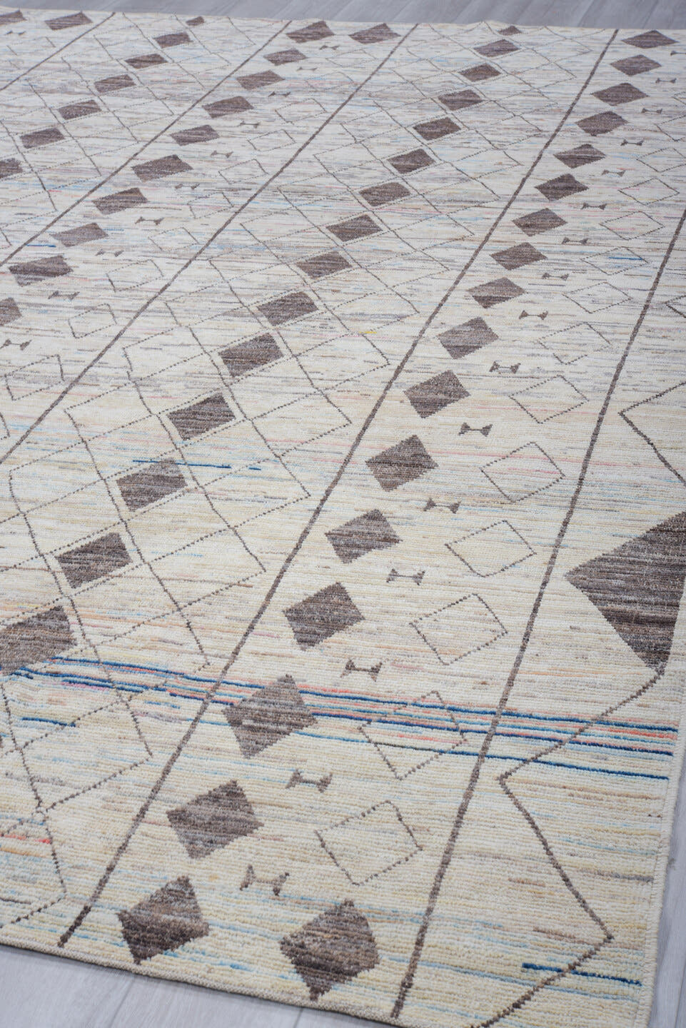 10' x 13' one-of-a-kind handmade vintage Tulu large size rug. Color palette: ivory, charcoal, sky_blue, taupe, blush, gray
