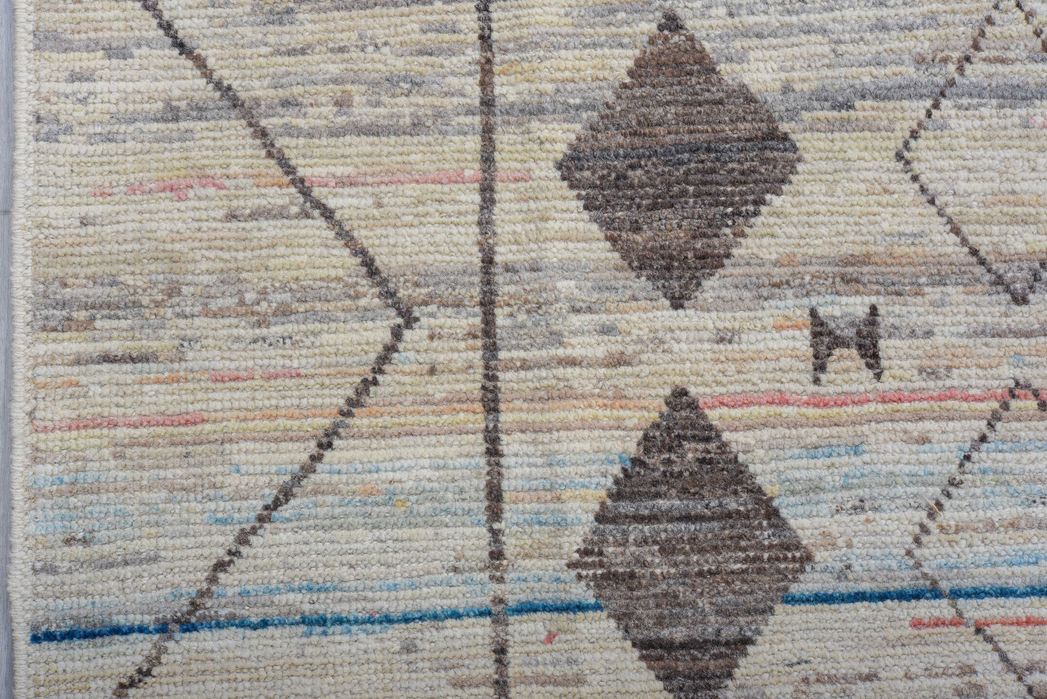 10' x 13' one-of-a-kind handmade vintage Tulu large size rug. Color palette: ivory, charcoal, sky_blue, taupe, blush, gray