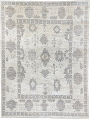 9' x 12' one-of-a-kind handmade vintage Tulu large size rug. Color palette: ivory, taupe, silver, beige, greige, gray