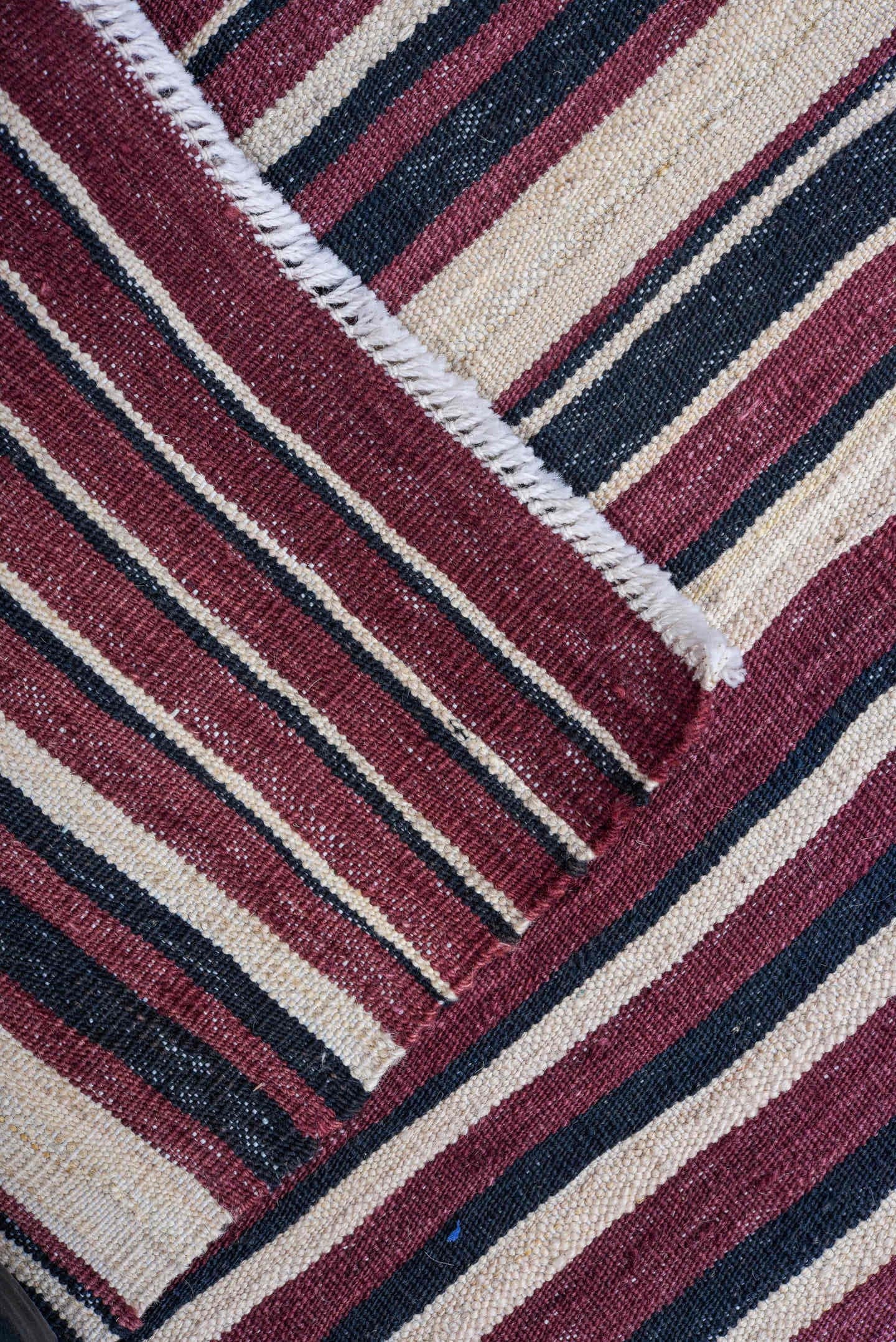 8' x 12' one-of-a-kind handmade vintage Kilim large size rug. Color palette: ivory, burgundy, plum, rust, charcoal, pink