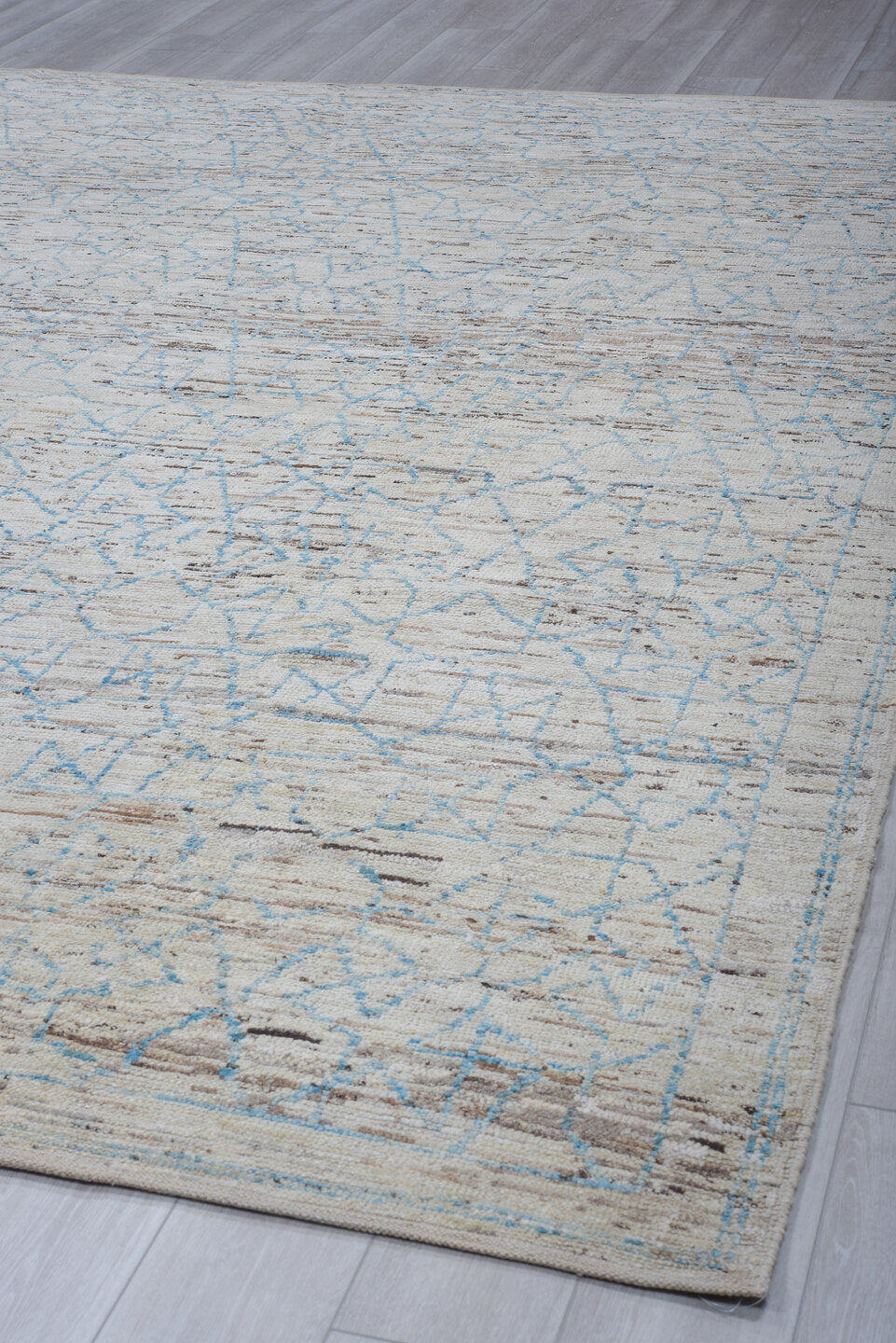 9' x 12' one-of-a-kind handmade vintage Tulu large size rug. Color palette: ivory, pale blue, taupe, gray, light blue, beige