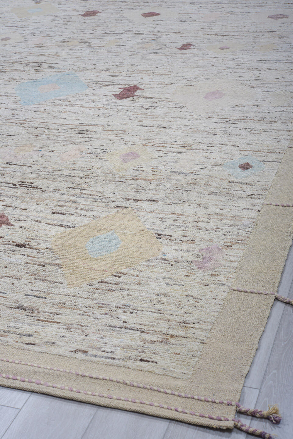 9' x 10' one-of-a-kind handmade vintage Tulu large size rug. Color palette: ivory, taupe, brown, sky_blue, lavender, beige