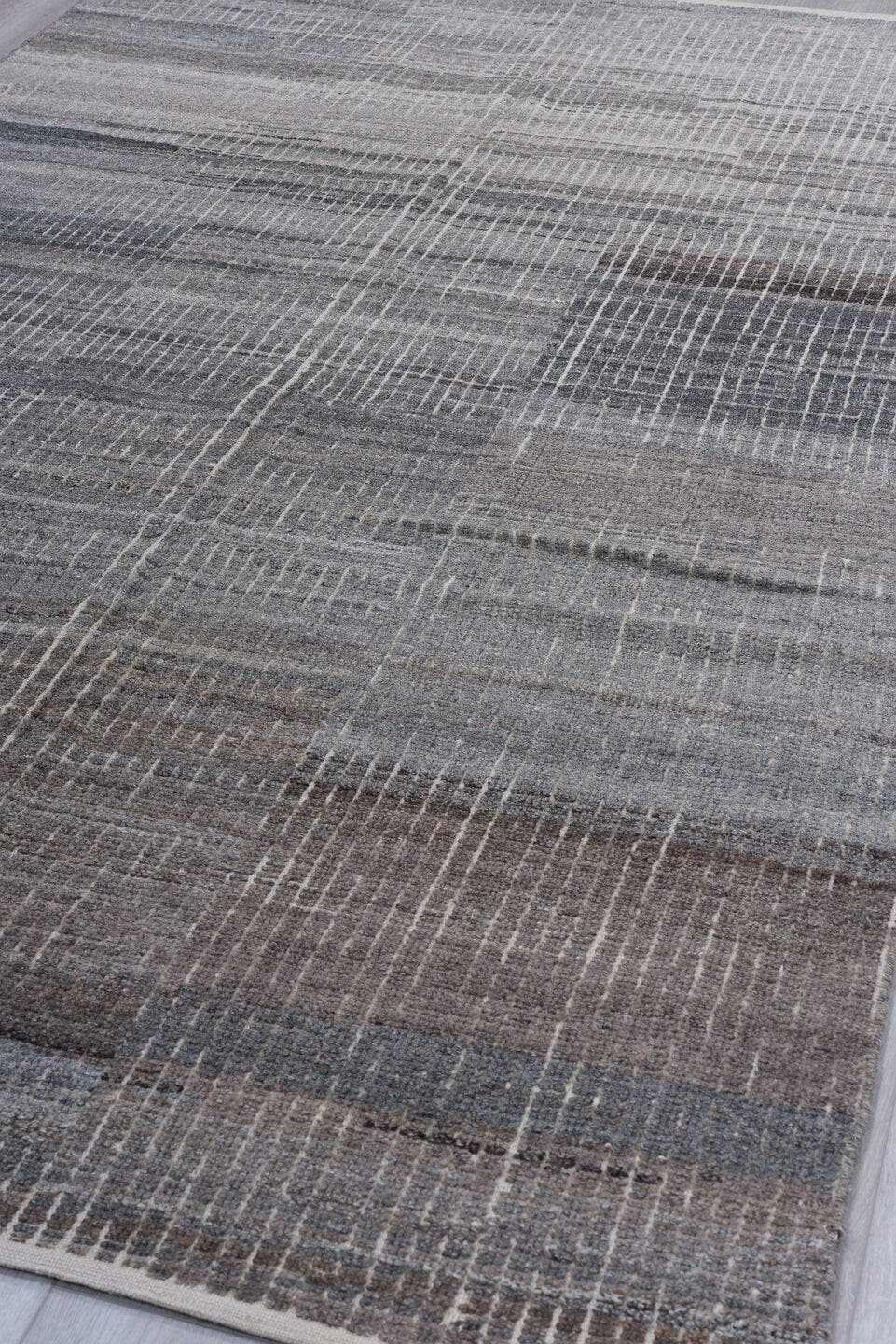 5' x 9' one-of-a-kind handmade vintage Tulu medium size rug. Color palette: gray, charcoal, taupe, ivory, greige, brown