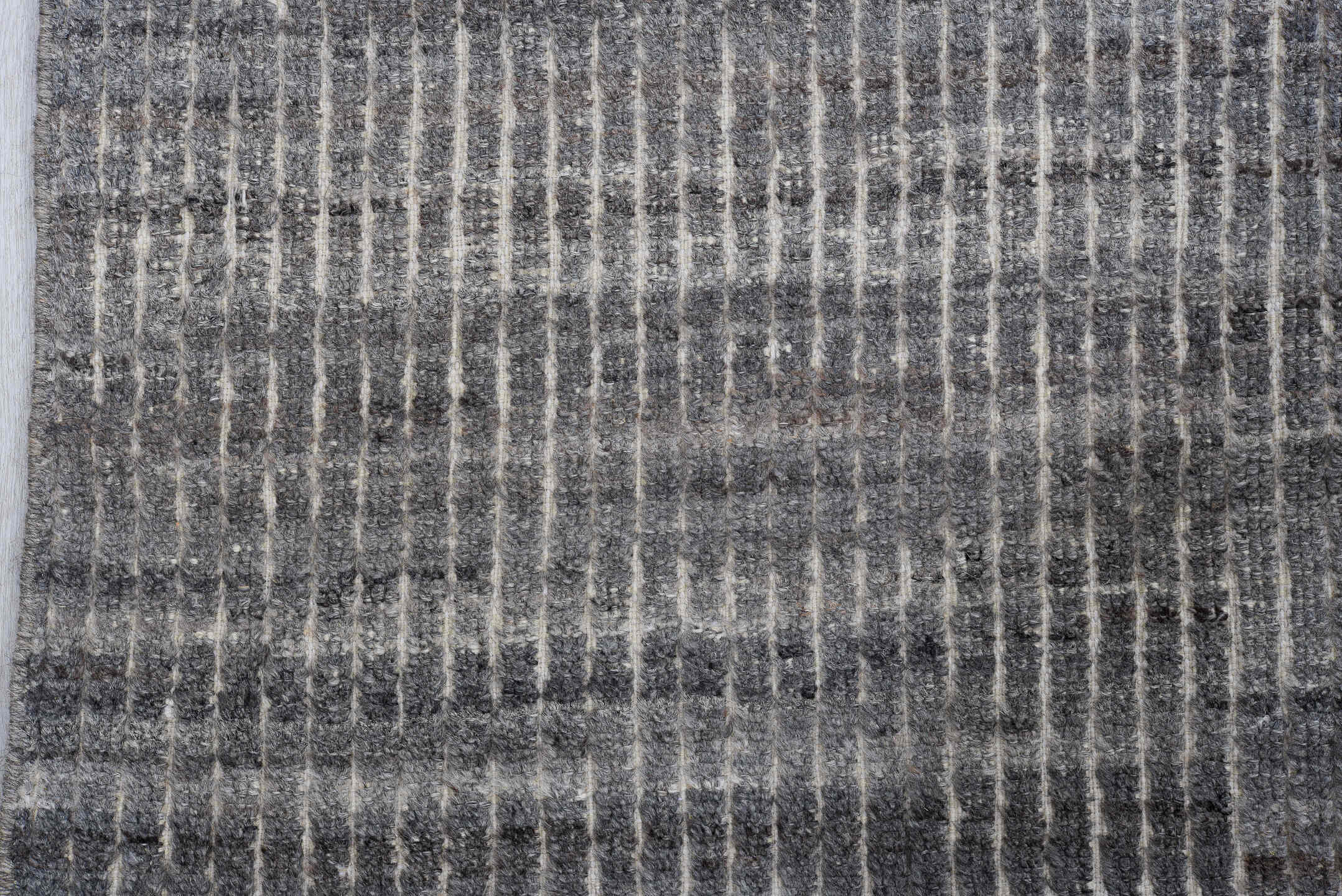 5' x 9' one-of-a-kind handmade vintage Tulu medium size rug. Color palette: gray, charcoal, taupe, ivory, greige, brown