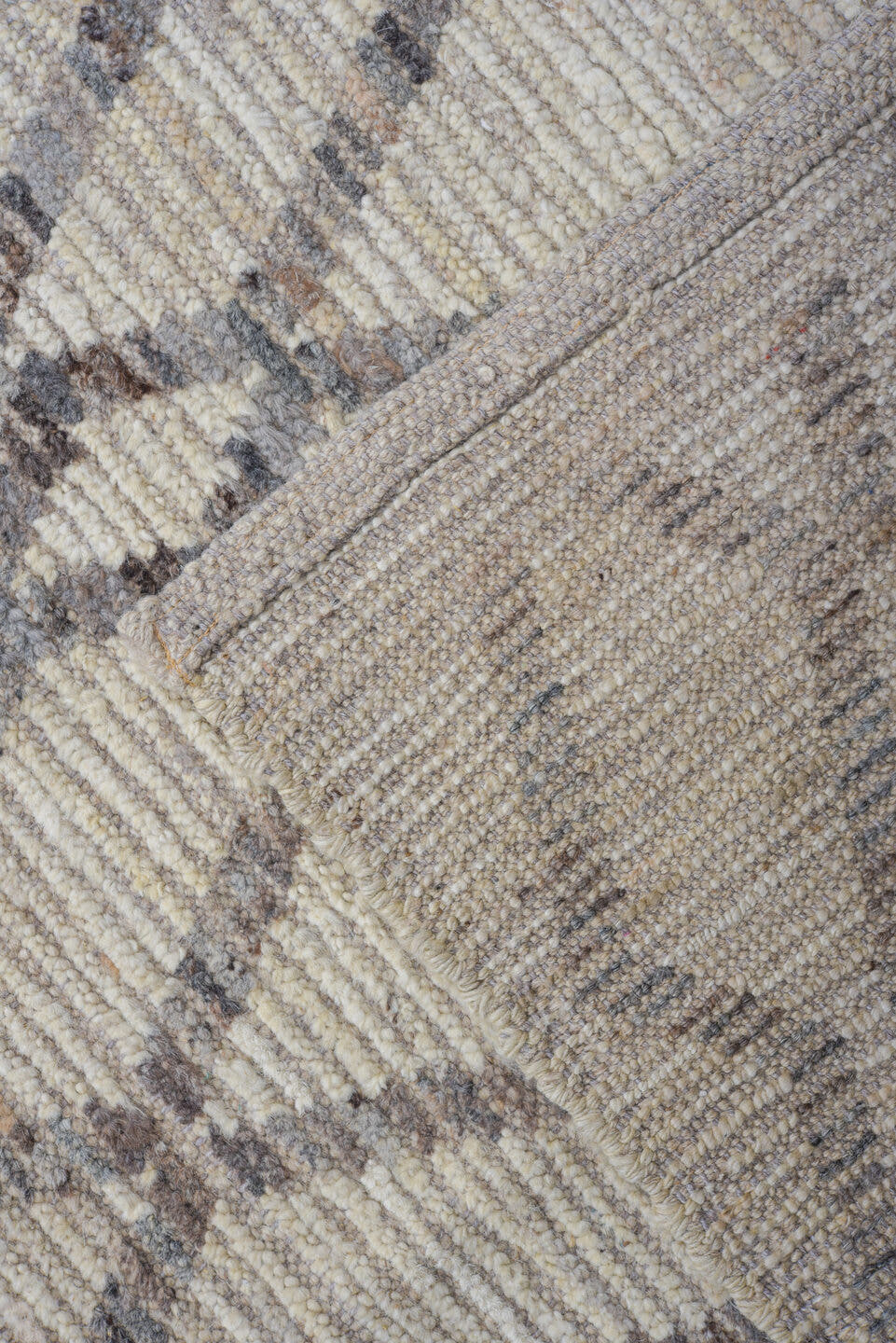 5' x 9' one-of-a-kind handmade vintage Tulu medium size rug. Color palette: ivory, gray, taupe, beige