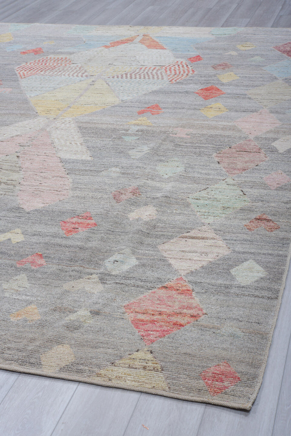10' x 13' one-of-a-kind handmade vintage Tulu large size rug. Color palette: gray, ivory, blush, faded coral, pale blue