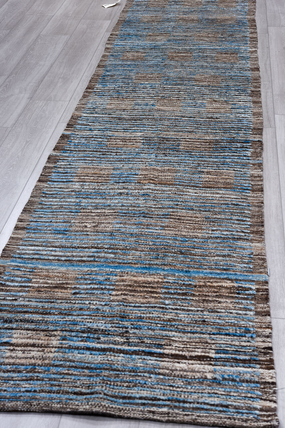 2' x 11' one-of-a-kind handmade vintage Tulu runner rug. Color palette: black, blue, gray, light blue, light gray, off-white