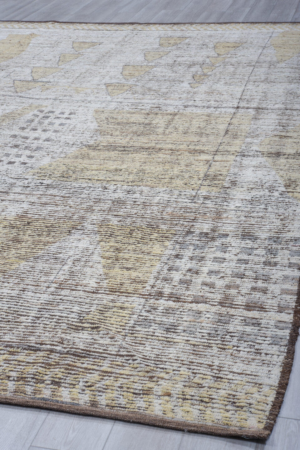 9' x 13' one-of-a-kind handmade vintage Tulu large size rug. Color palette: ivory, taupe, brown, cream, camel, charcoal