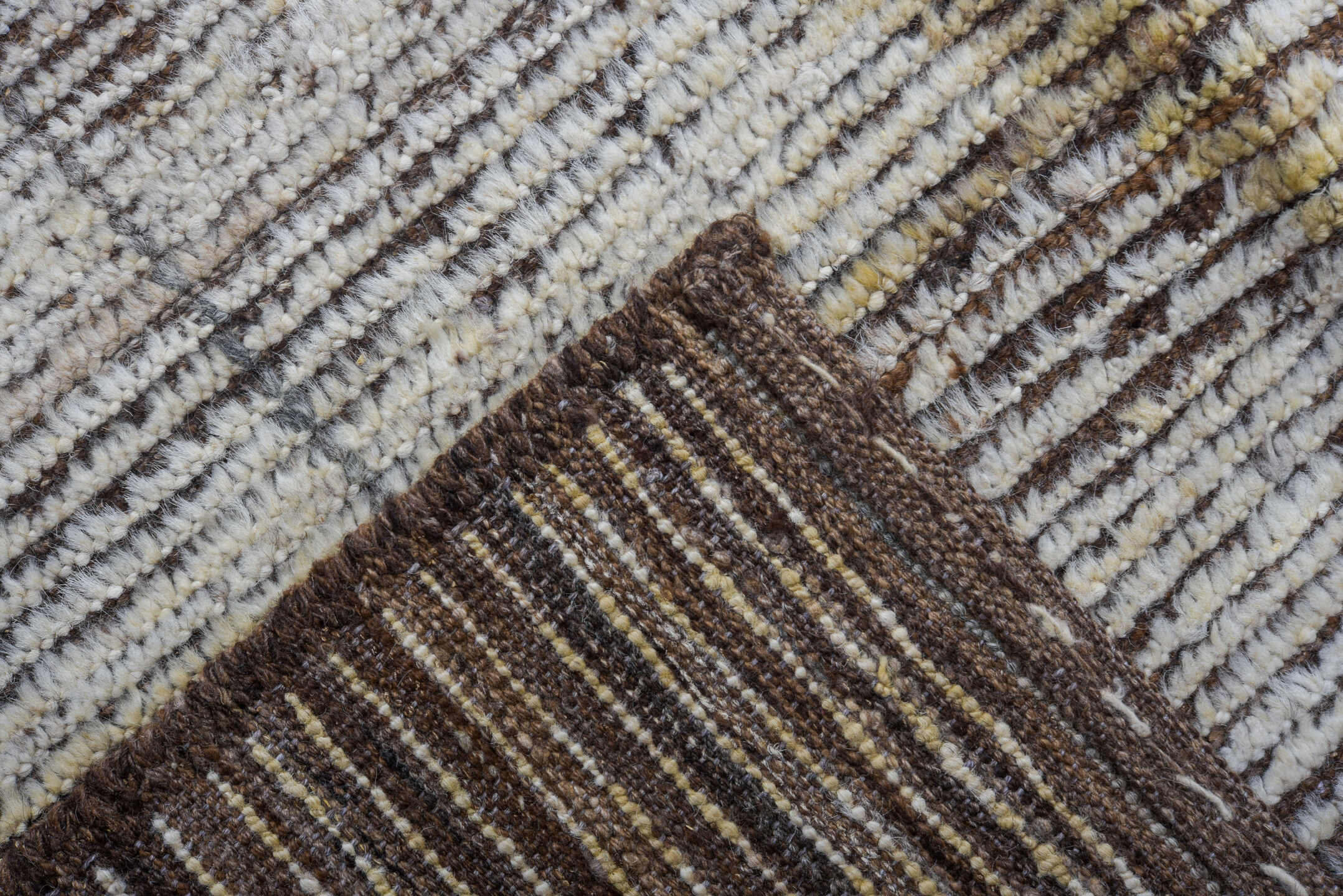 9' x 13' one-of-a-kind handmade vintage Tulu large size rug. Color palette: ivory, taupe, brown, cream, camel, charcoal