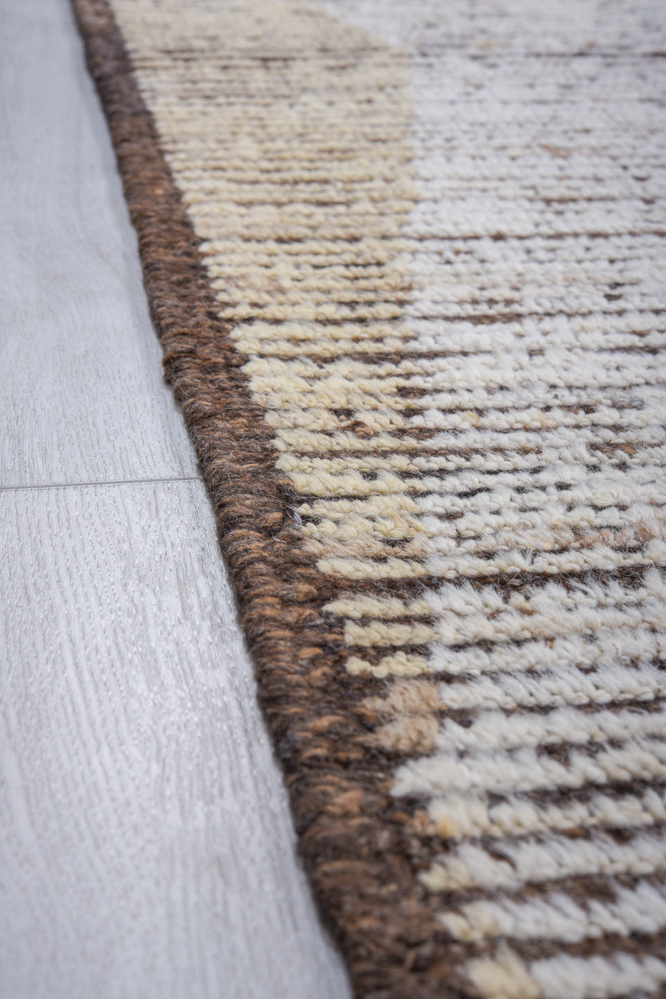 9' x 13' one-of-a-kind handmade vintage Tulu large size rug. Color palette: ivory, taupe, brown, cream, camel, charcoal