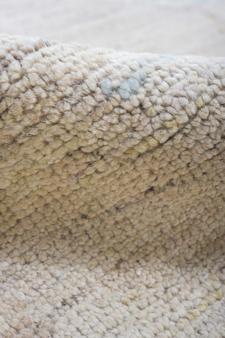 8' x 9' one-of-a-kind handmade vintage Tulu rug. Color palette: taupe, ivory, pale blue, beige, gray, light blue
