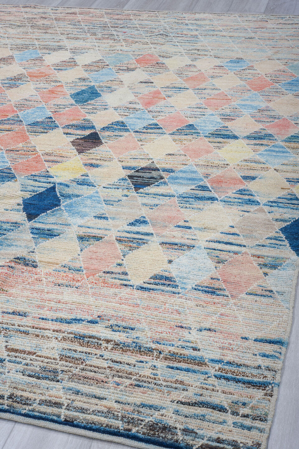 8' x 9' one-of-a-kind handmade vintage Tulu rug. Color palette: ivory, sky_blue, navy, coral, charcoal, cream, pale_yellow