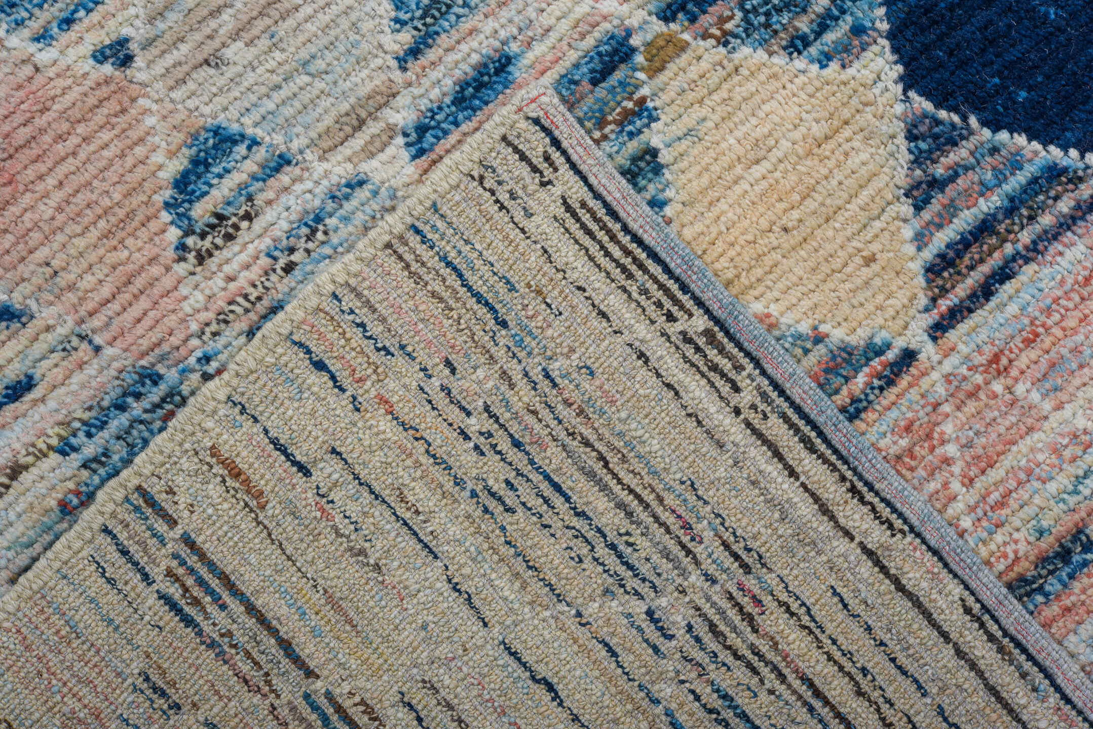 8' x 9' one-of-a-kind handmade vintage Tulu rug. Color palette: ivory, sky_blue, navy, coral, charcoal, cream, pale_yellow