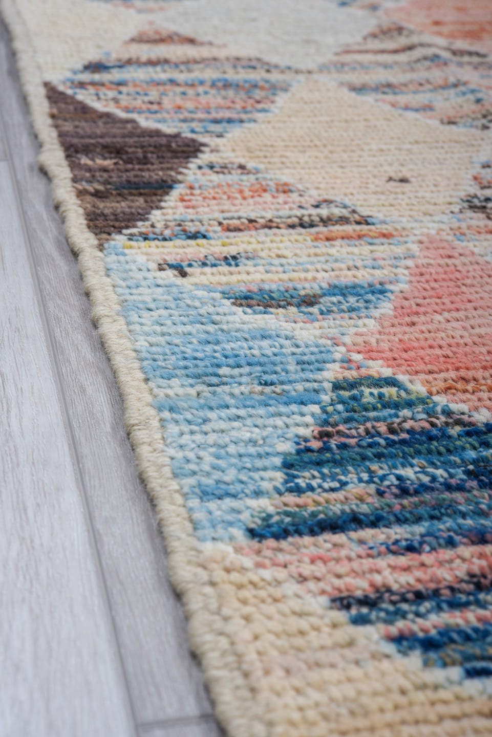 8' x 9' one-of-a-kind handmade vintage Tulu rug. Color palette: ivory, sky_blue, navy, coral, charcoal, cream, pale_yellow