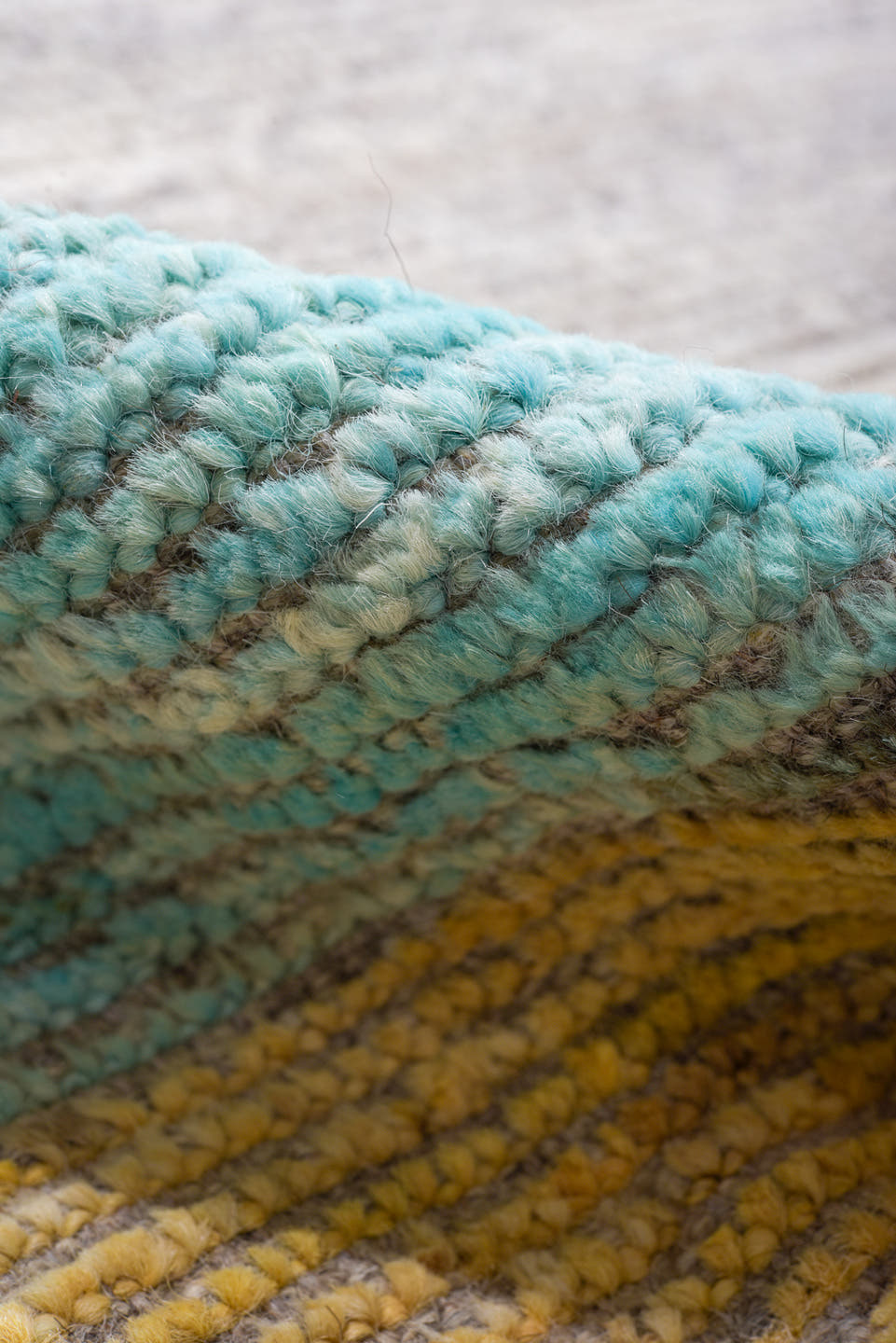 6' x 8' one-of-a-kind handmade vintage Tulu medium size rug. Color palette: gray, orange, turquoise, lavender, butter yellow