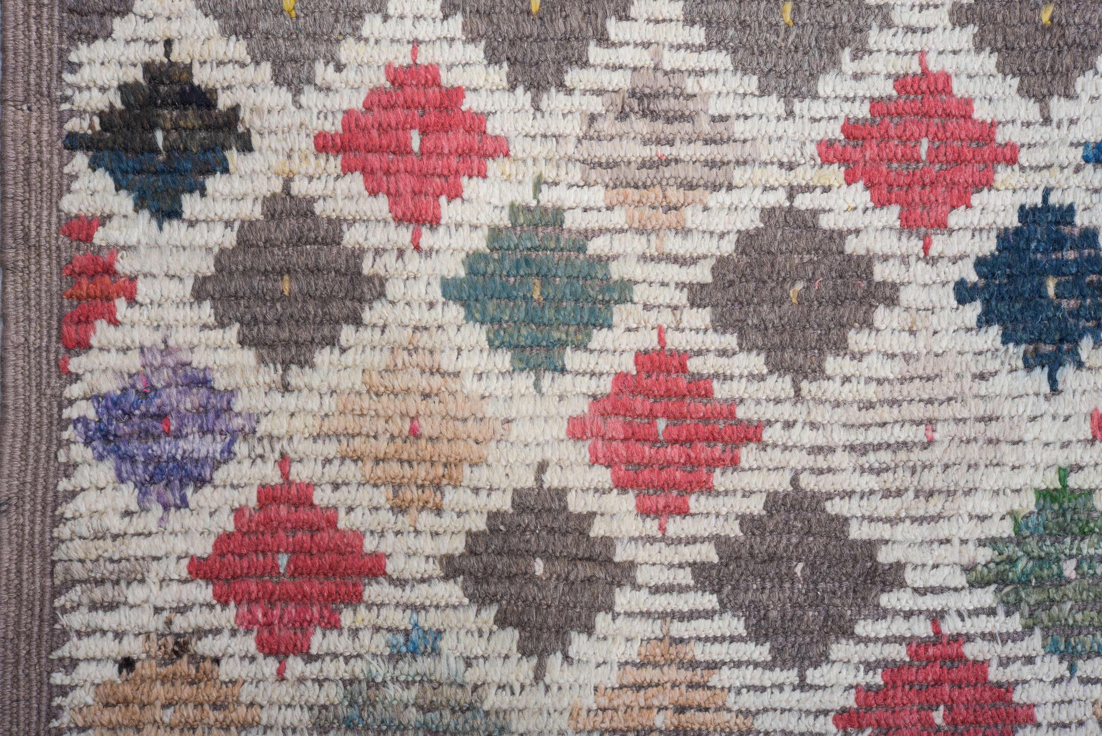 10' x 14' one-of-a-kind handmade vintage Tulu large size rug. Color palette: ivory, taupe, rose, sky blue, charcoal, camel