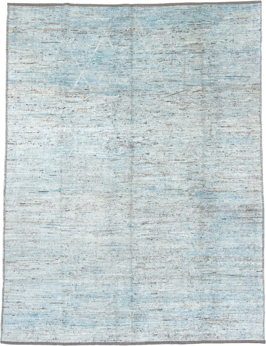 9' x 12' one-of-a-kind handmade vintage Tulu large size rug. Color palette: ivory, pale blue, sky blue, taupe, gray