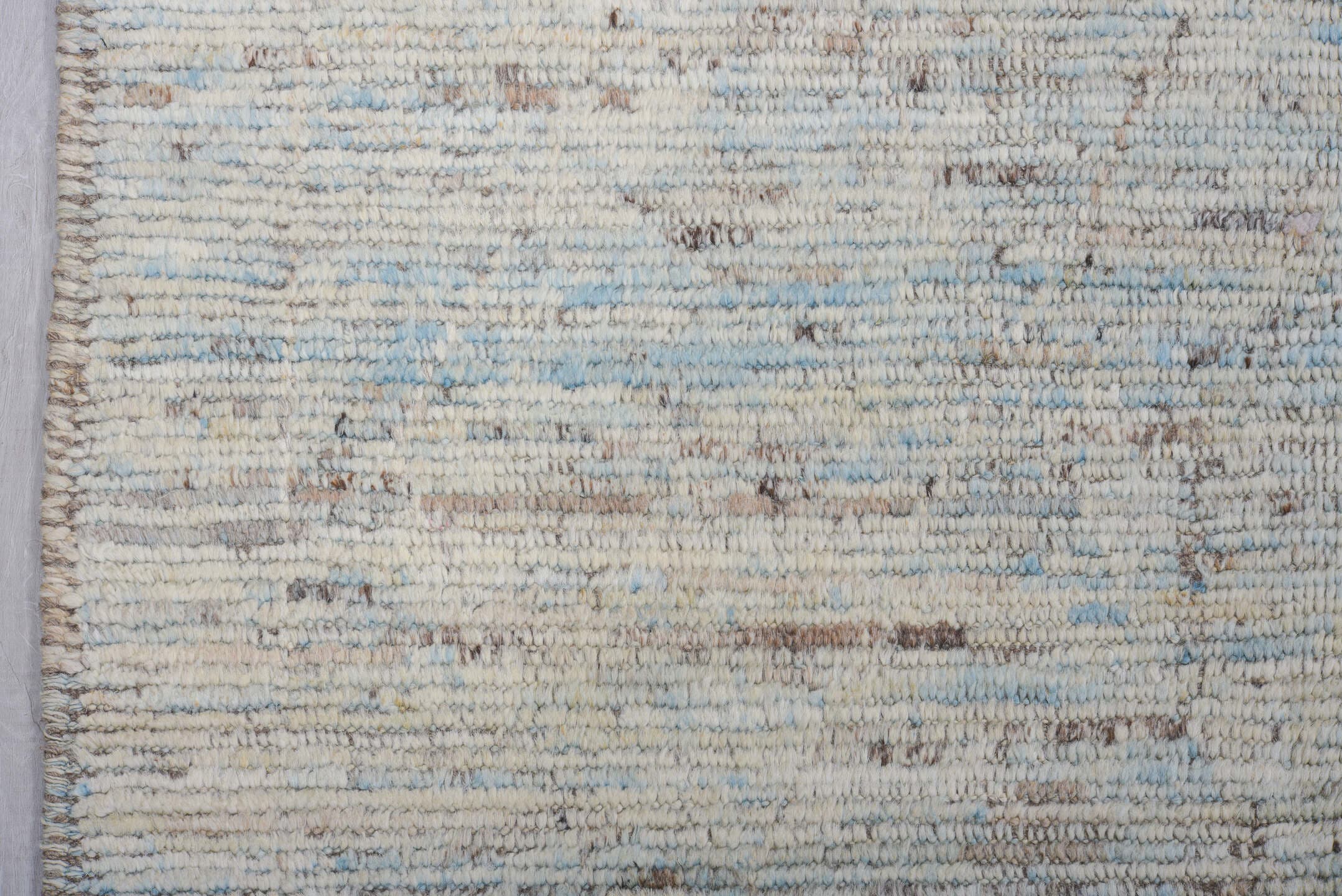 9' x 12' one-of-a-kind handmade vintage Tulu large size rug. Color palette: ivory, pale blue, sky blue, taupe, gray