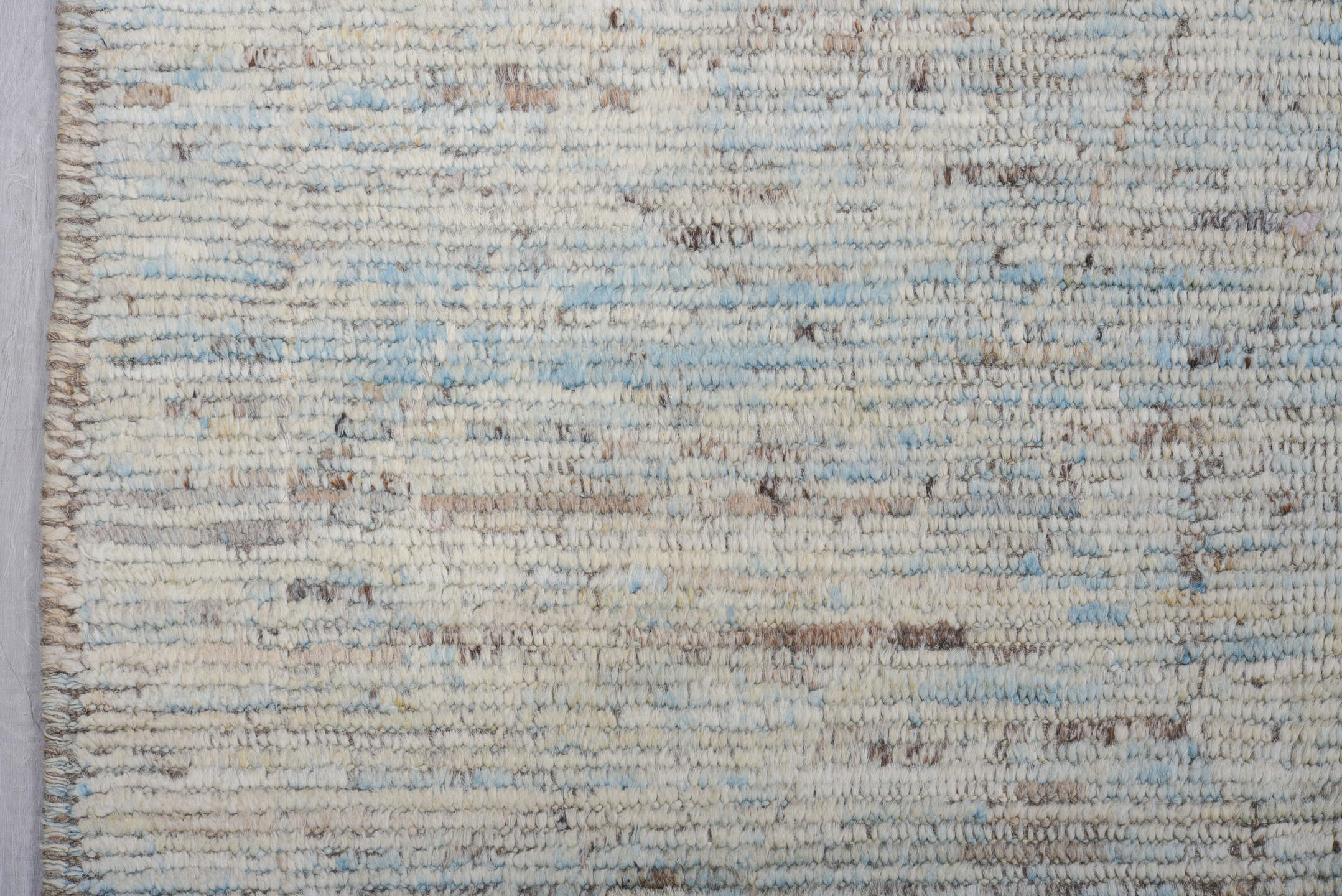 9' x 12' one-of-a-kind handmade vintage Tulu large size rug. Color palette: ivory, pale blue, sky blue, taupe, gray
