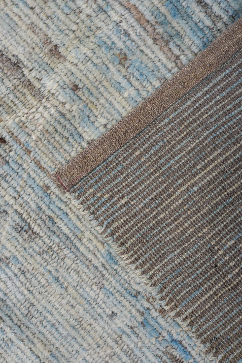 9' x 12' one-of-a-kind handmade vintage Tulu large size rug. Color palette: ivory, pale blue, sky blue, taupe, gray