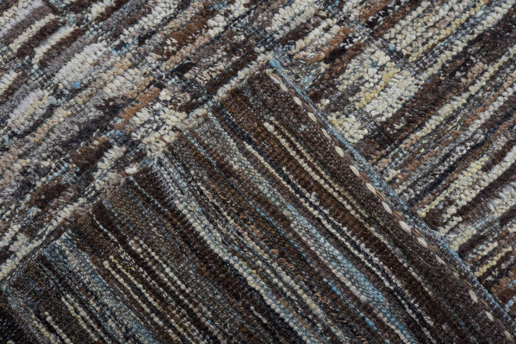 9' x 14' one-of-a-kind handmade vintage Tulu large size rug. Color palette: ivory, taupe, brown, gray, charcoal, beige