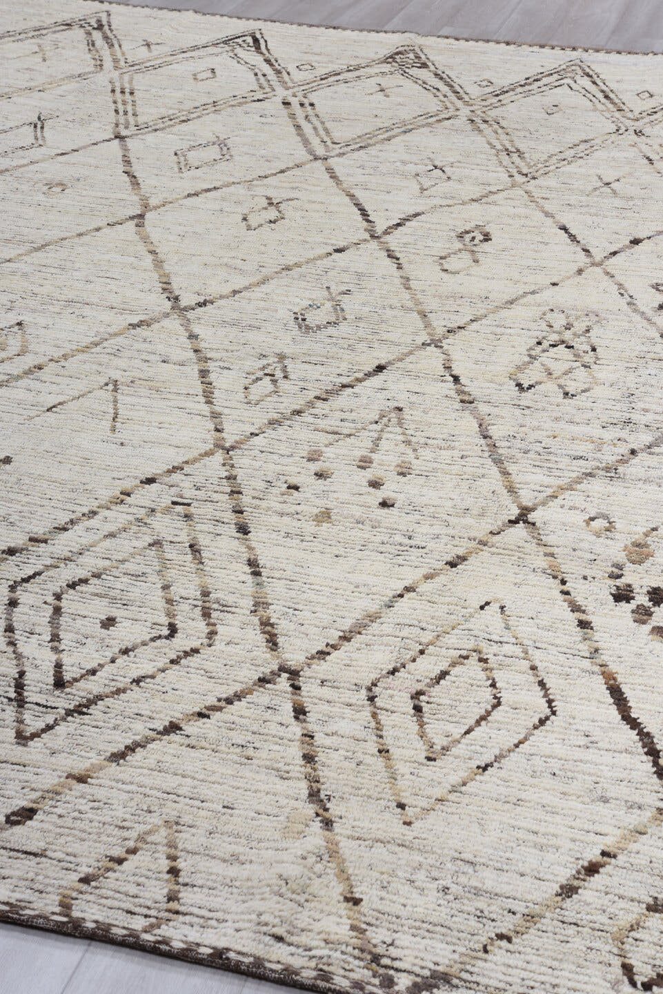 10' x 13' one-of-a-kind handmade vintage Tulu large size rug. Color palette: ivory, taupe, brown, charcoal, cream, beige