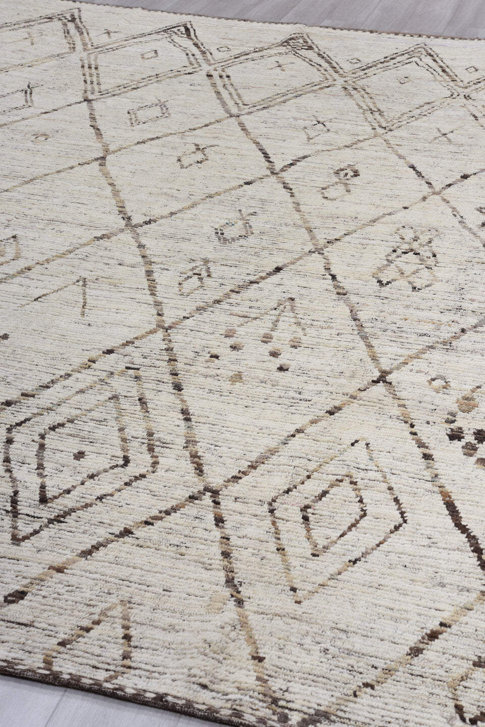 10' x 13' one-of-a-kind handmade vintage Tulu large size rug. Color palette: ivory, taupe, brown, charcoal, cream, beige