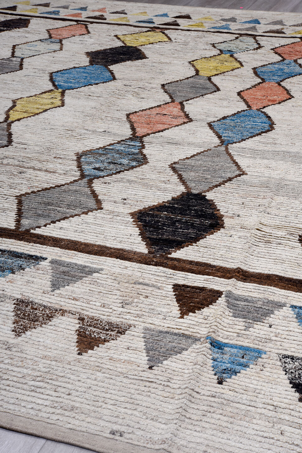 14' x 16' one-of-a-kind handmade vintage Tulu oversize rug. Color palette: ivory, gray, sky_blue, charcoal, blush, yellow