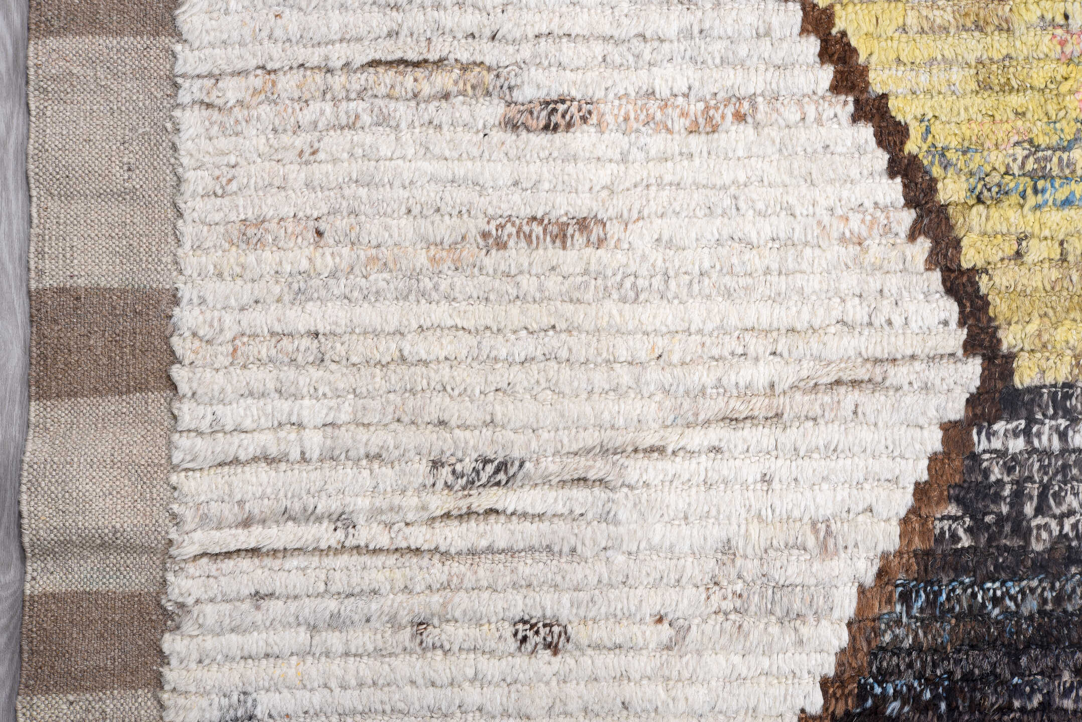 14' x 16' one-of-a-kind handmade vintage Tulu oversize rug. Color palette: ivory, gray, sky_blue, charcoal, blush, yellow