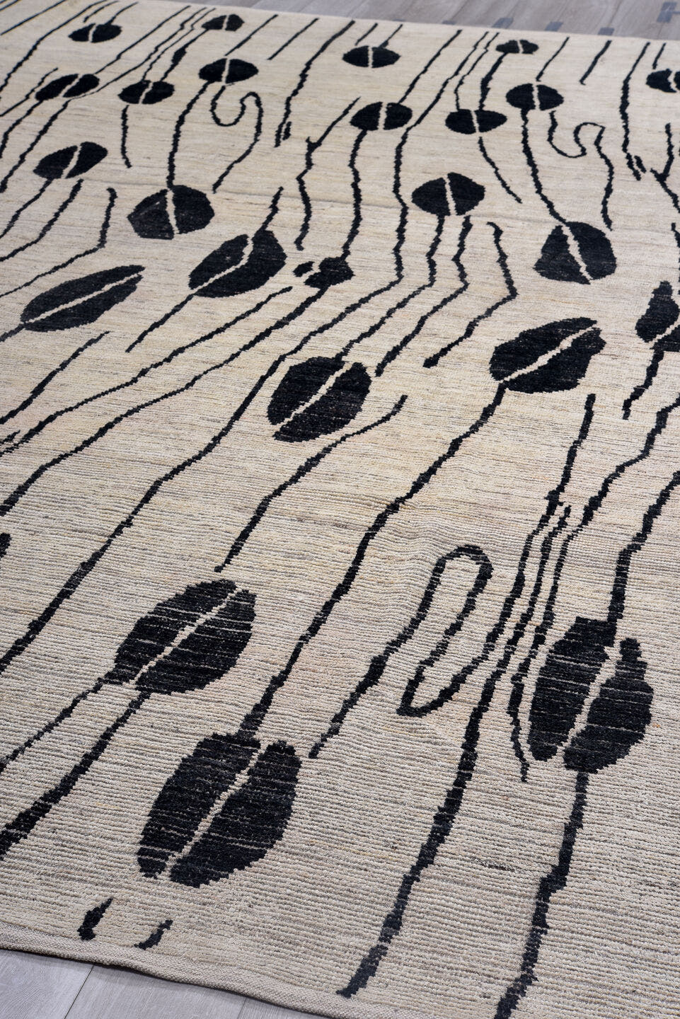 12' x 15' one-of-a-kind handmade vintage Tulu oversize rug. Color palette: ivory, charcoal, black, gray