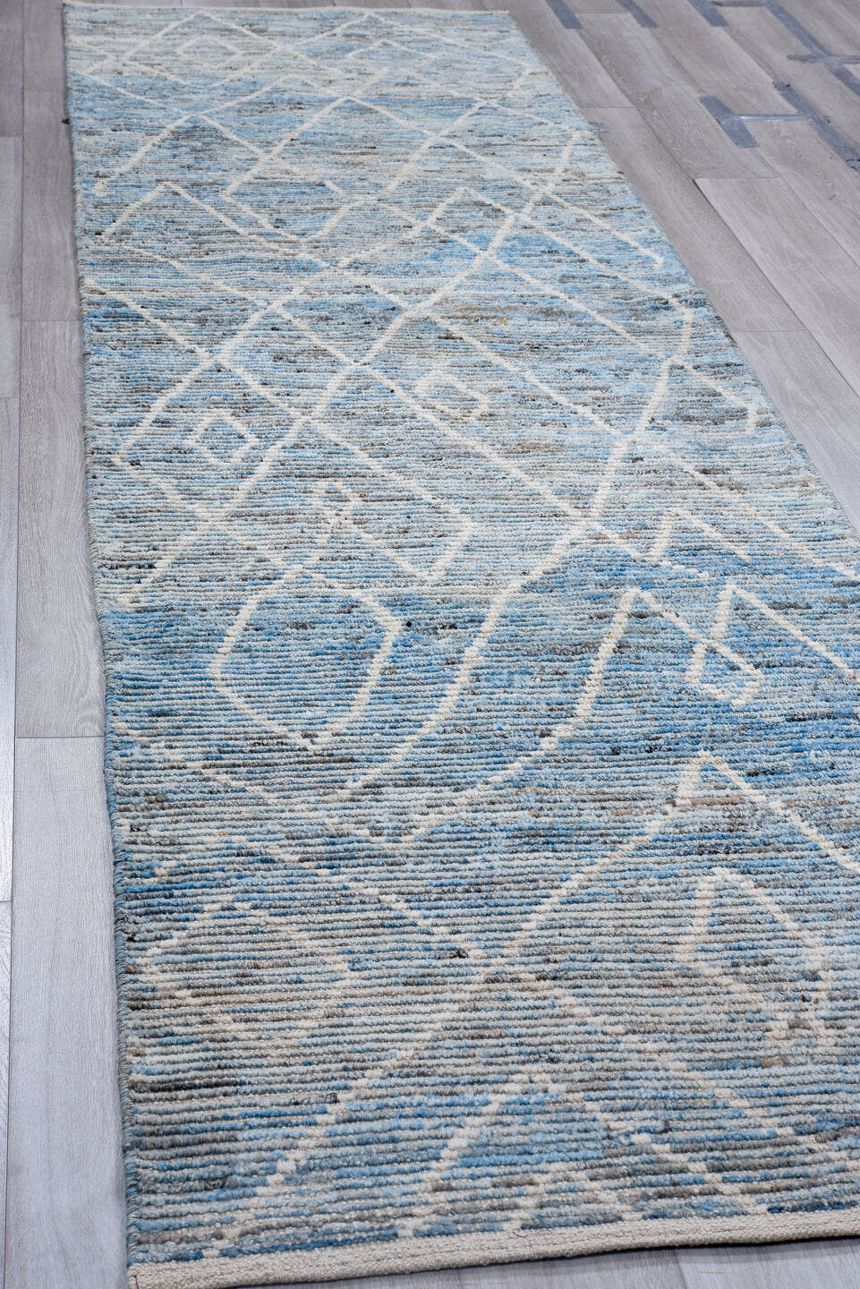 3' x 12' one-of-a-kind handmade vintage Tulu runner rug. Color palette: sky blue, ivory, slate, gray, charcoal, light blue