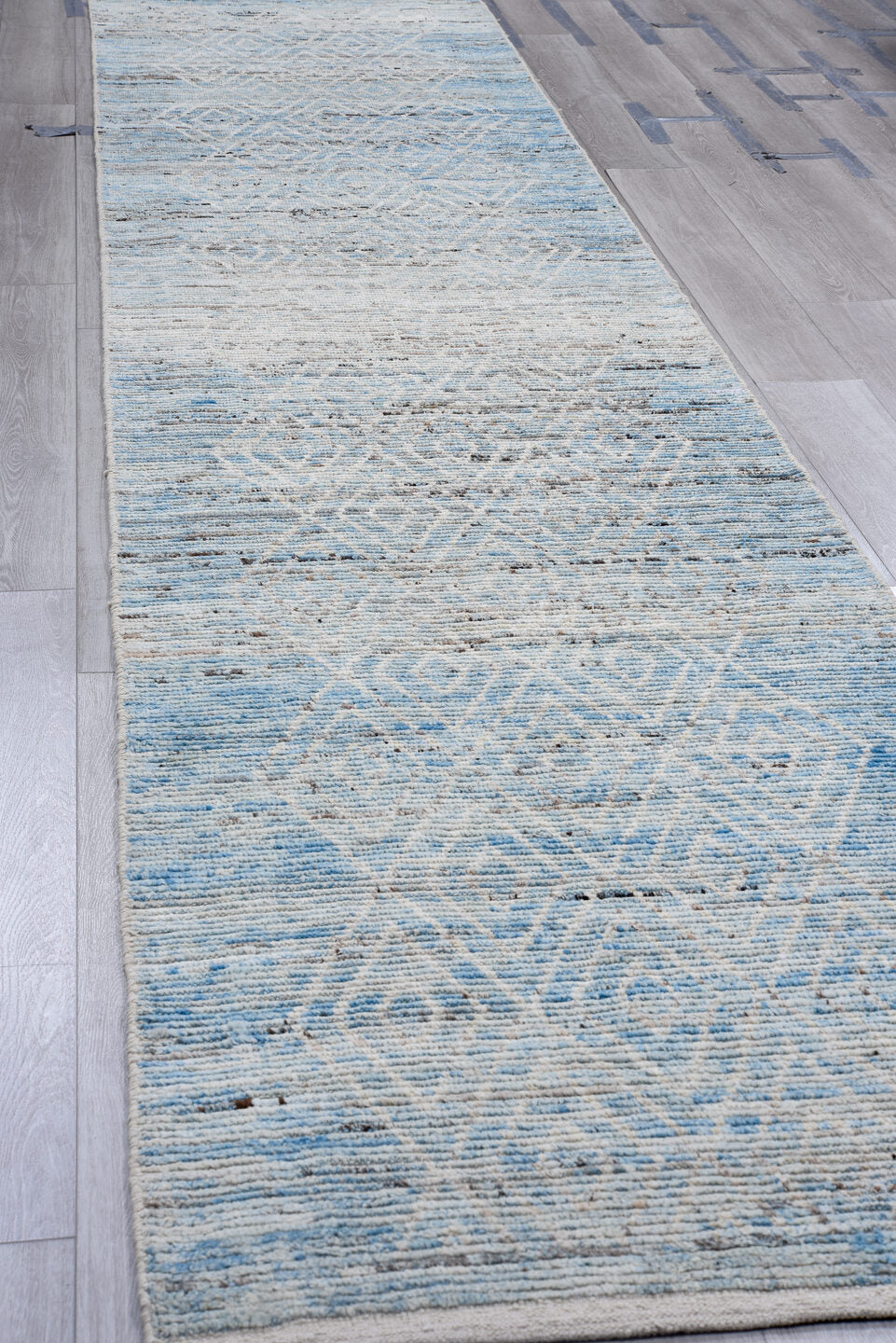 3' x 16' one-of-a-kind handmade vintage Tulu runner rug. Color palette: ivory, sky blue, slate, charcoal, light gray
