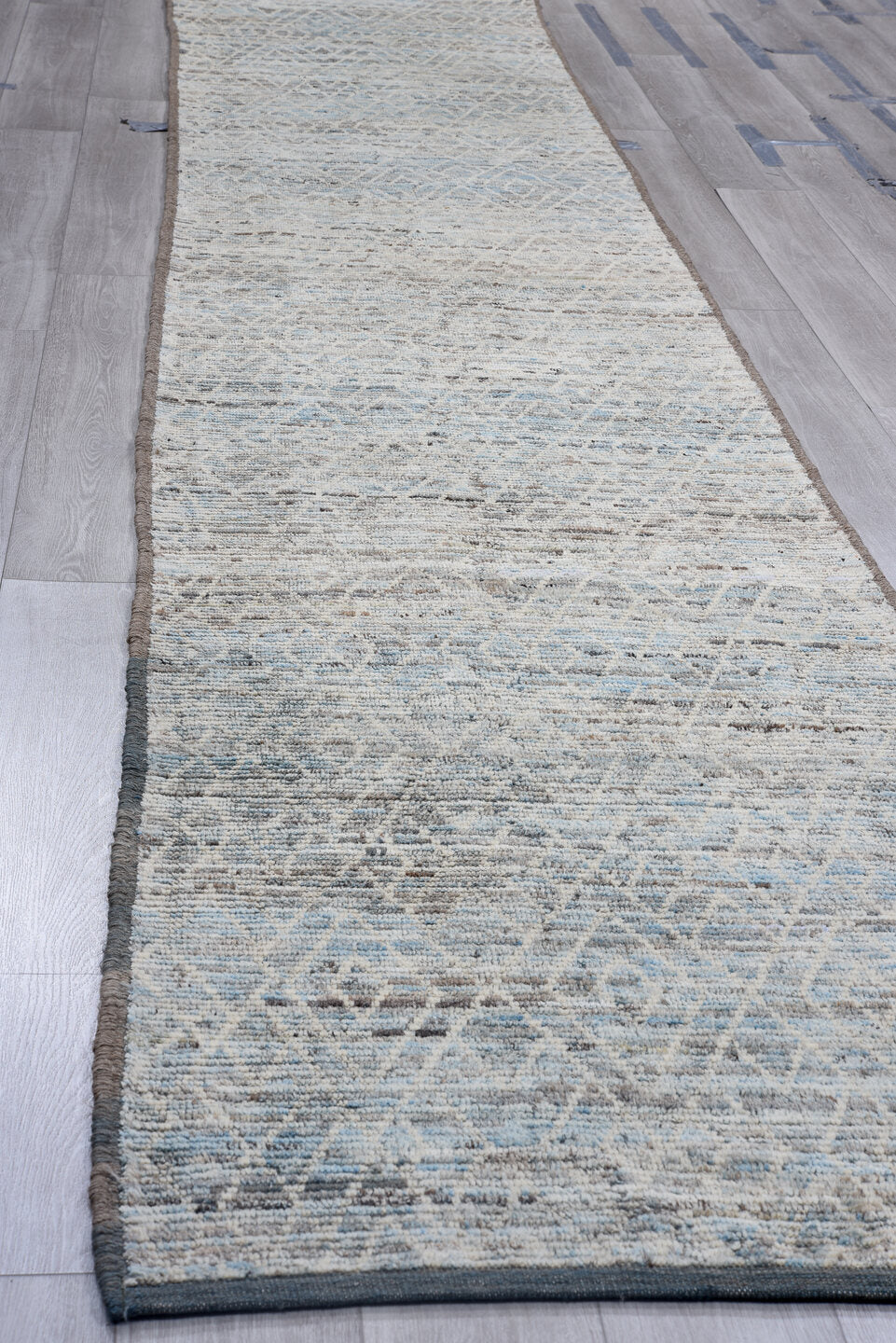 3' x 16' one-of-a-kind handmade vintage Tulu runner rug. Color palette: gray, blue, ivory, charcoal, black