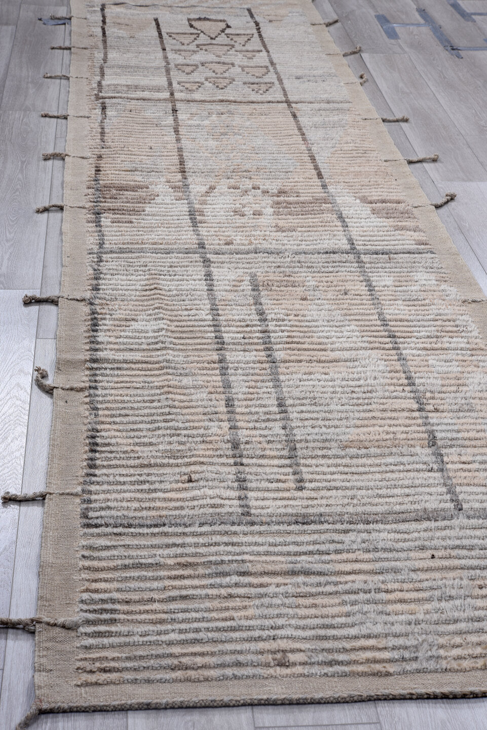 3' x 12' one-of-a-kind handmade vintage Tulu runner rug. Color palette: taupe, ivory, brown, gray, camel, beige
