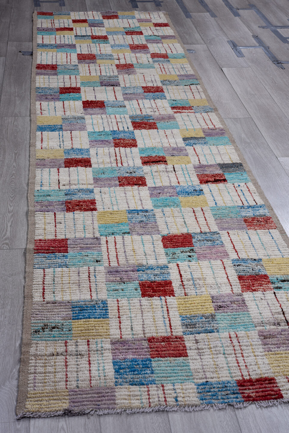3' x 13' one-of-a-kind handmade vintage Tulu runner rug. Color palette: ivory, sky blue, crimson, lavender, pale gold, slate