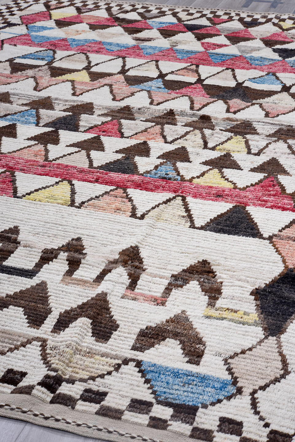 9' x 12' one-of-a-kind handmade vintage Tulu large size rug. Color palette: ivory, brown, rose, sky_blue, gray, black